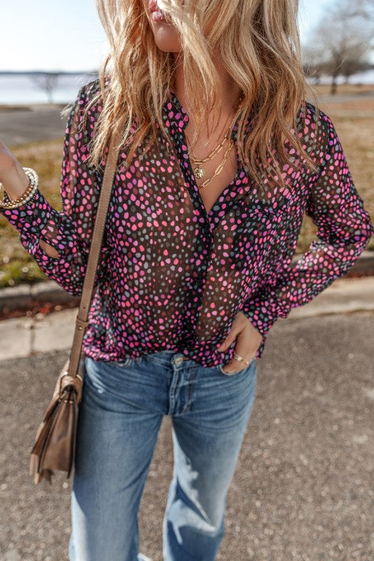 Buttoned front allows easy layering and adjustable coverage. 