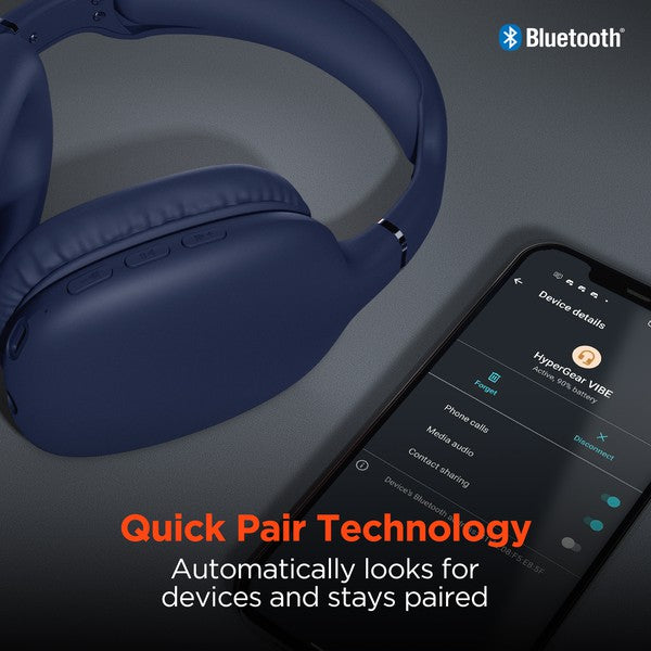 A Navy blue HyperGear VIBE Wireless Headphones  place beside phones