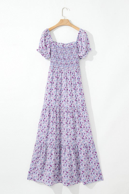 The bubble-sleeve shirred high-waist maxi dress combines voluminous, playful sleeves with a flattering gathered waist to create a flowy, elegant silhouette.