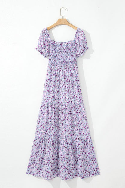 The bubble-sleeve shirred high-waist maxi dress combines voluminous, playful sleeves with a flattering gathered waist to create a flowy, elegant silhouette.