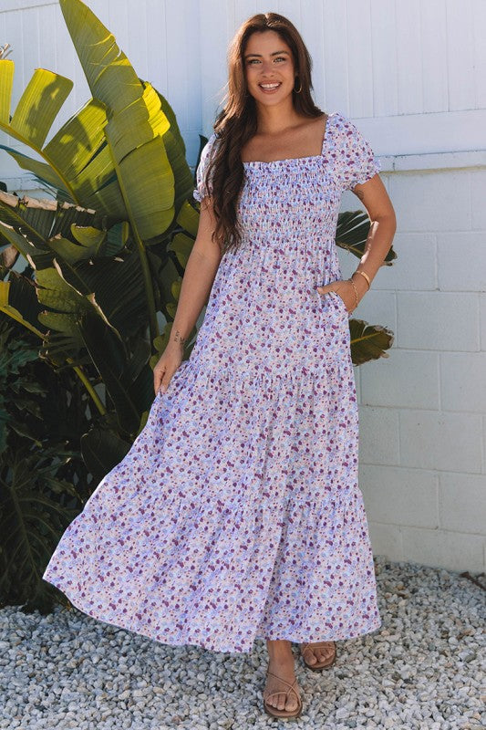 The bubble-sleeve shirred high-waist maxi dress combines voluminous, playful sleeves with a flattering gathered waist to create a flowy, elegant silhouette.