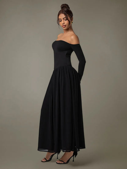 A floor-length black off-shoulder gown with a fitted bodice and voluminous skirt.