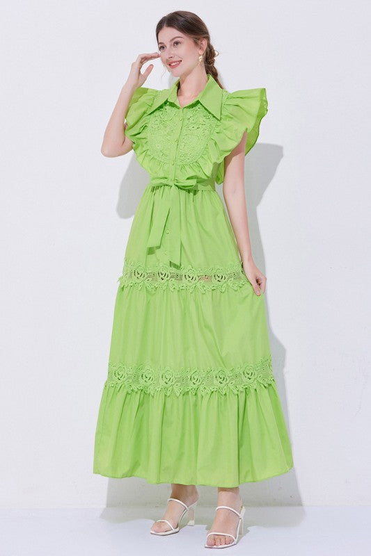 A green, midi-length piece with a tiered, ruffled silhouette and short puff sleeves, featuring delicate lace detailing for a romantic, bohemian look.