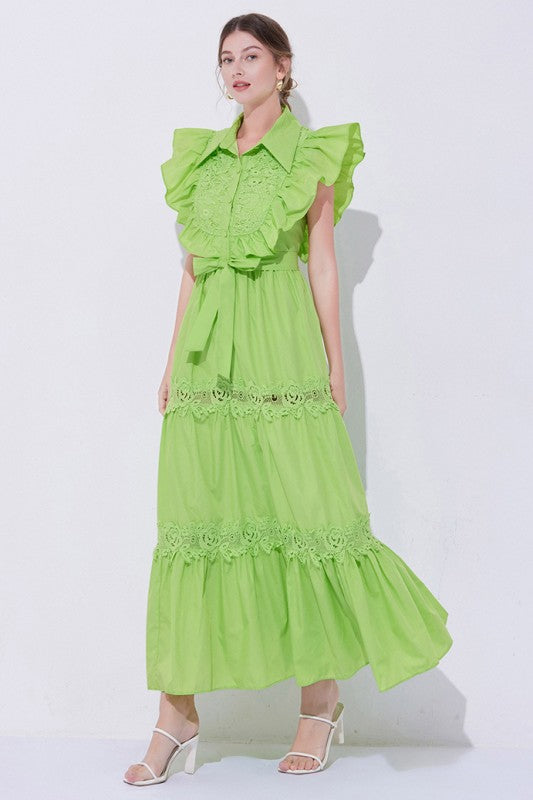 A green, midi-length piece with a tiered, ruffled silhouette and short puff sleeves, featuring delicate lace detailing for a romantic, bohemian look.