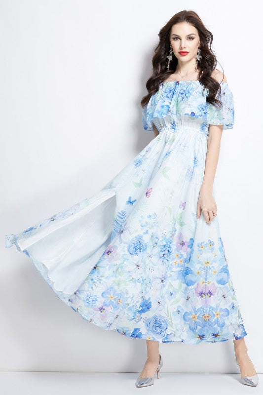 A light blue floral maxi dress with off-shoulder sleeves and a flowing, airy skirt.

