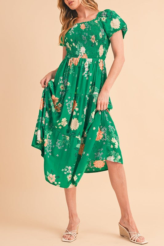 Casual spring or vacation dress, midi length, featuring a flattering smocked top and all-over flower pattern.