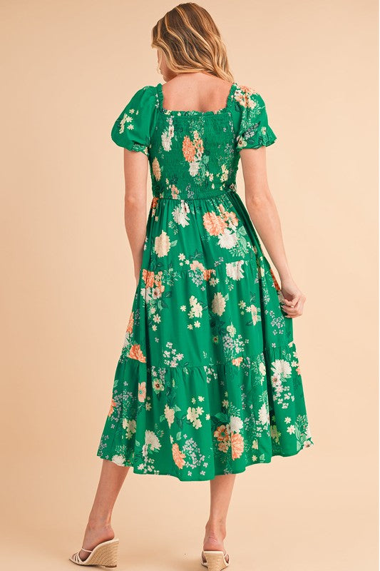 Casual spring or vacation dress, midi length, featuring a flattering smocked top and all-over flower pattern.