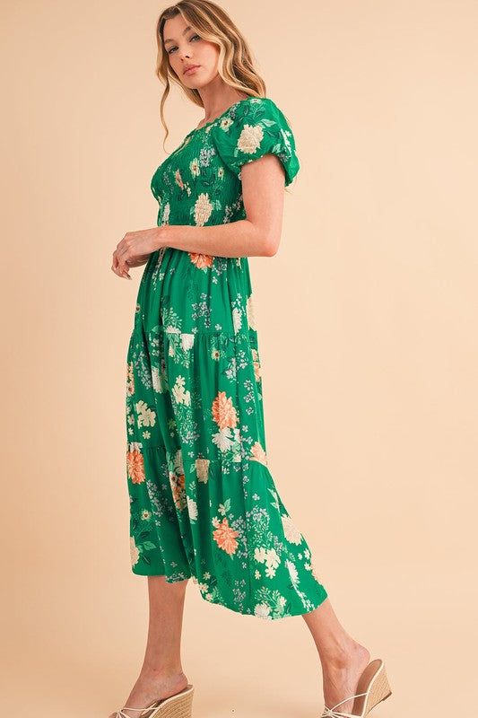 Casual spring or vacation dress, midi length, featuring a flattering smocked top and all-over flower pattern.