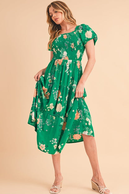 Casual spring or vacation dress, midi length, featuring a flattering smocked top and all-over flower pattern.