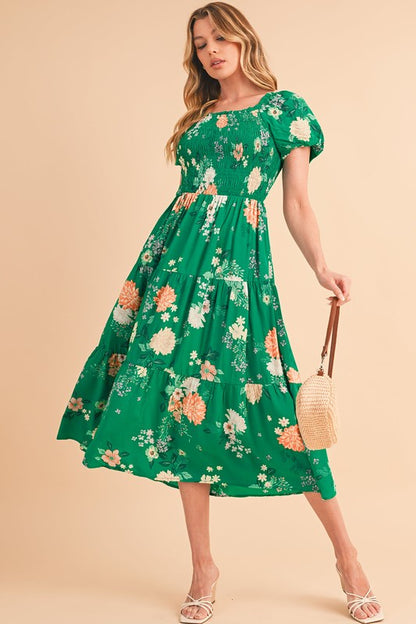 Casual spring or vacation dress, midi length, featuring a flattering smocked top and all-over flower pattern.