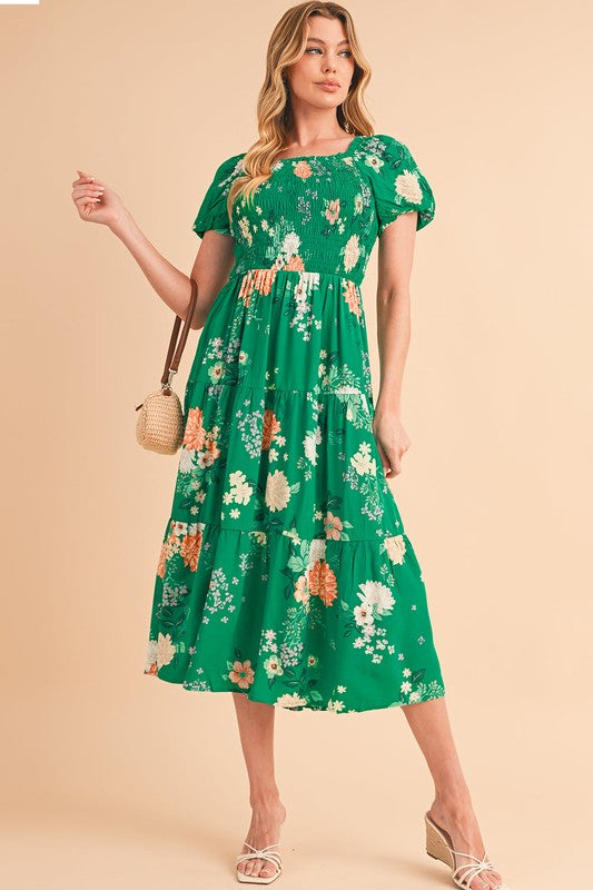 Casual spring or vacation dress, midi length, featuring a flattering smocked top and all-over flower pattern.