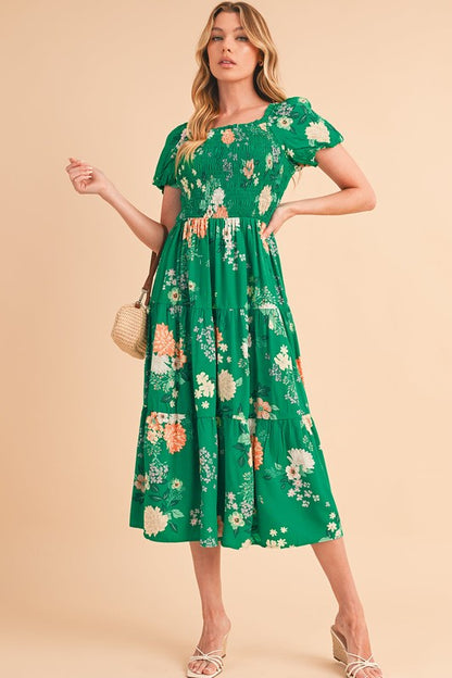 Casual spring or vacation dress, midi length, featuring a flattering smocked top and all-over flower pattern.