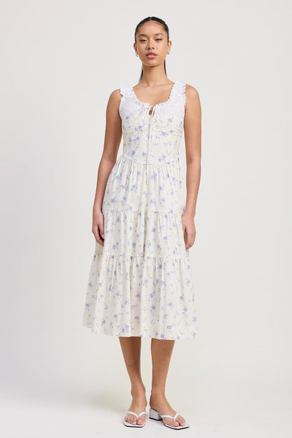 Women's floral print midi dress with lace trim, tiered skirt, and tie-front detail.
