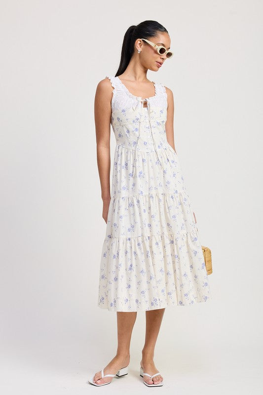 Women's floral print midi dress with lace trim, tiered skirt, and tie-front detail.