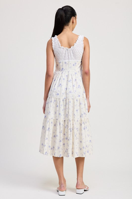 Women's floral print midi dress with lace trim, tiered skirt, and tie-front detail.