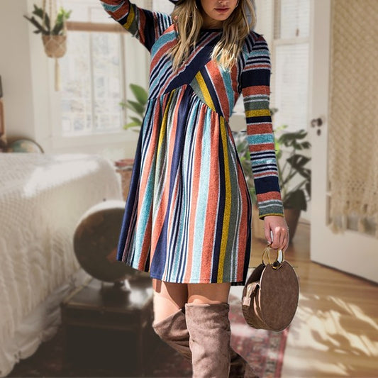 Women's long sleeve knit dress with multi-stripe pattern, A-line skirt, and empire waist.