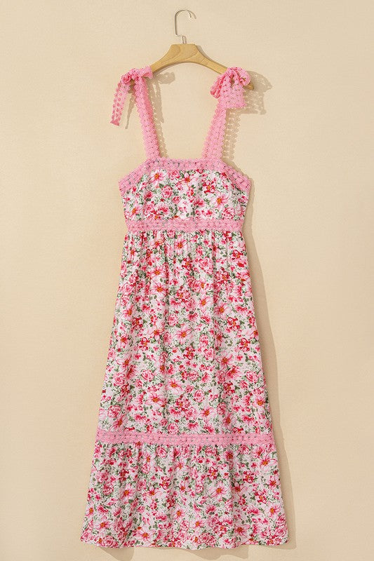 Women's floral print midi sundress with smocked bodice and tie shoulder straps.