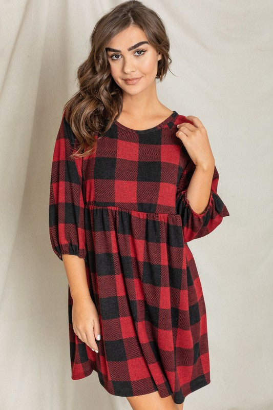 Checkered pattern swing dress, relaxed fit, high round neck, and gathered empire waist.