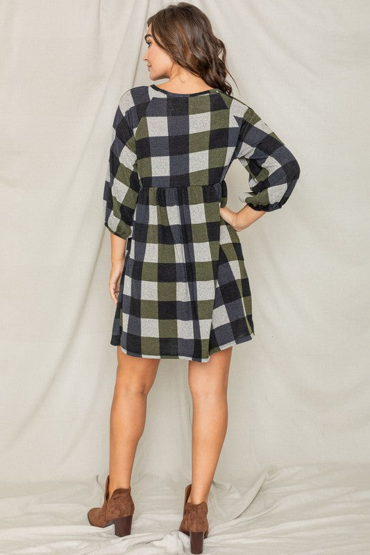 Checkered pattern swing dress, relaxed fit, high round neck, and gathered empire waist.
