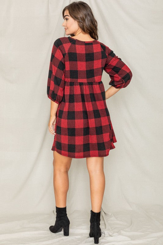 Checkered pattern swing dress, relaxed fit, high round neck, and gathered empire waist.