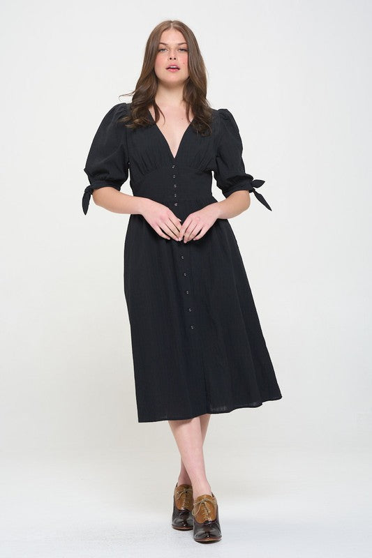 Women's button-front midi dress with V-neck, shirred waist, and 3/4 puff sleeves.