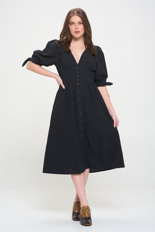 Women's button-front midi dress with V-neck, shirred waist, and 3/4 puff sleeves.