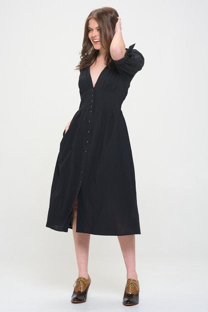 Women's button-front midi dress with V-neck, shirred waist, and 3/4 puff sleeves.