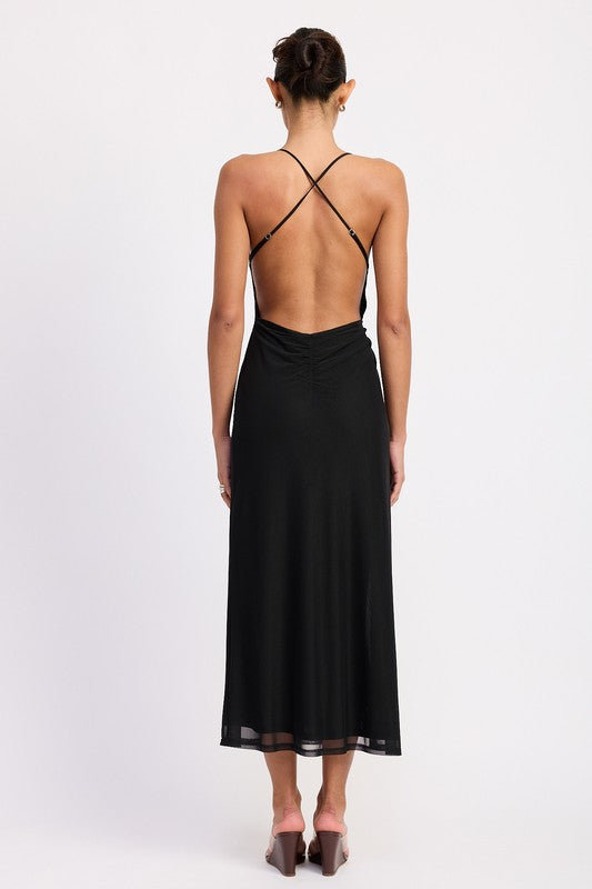 Black cowl neck maxi dress with high side slit, gold O-ring detail, and halter neckline.