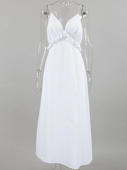 A graceful, floor-length maxi dress featuring a feminine ruffled V-neckline that adds romantic volume and movement to every step.