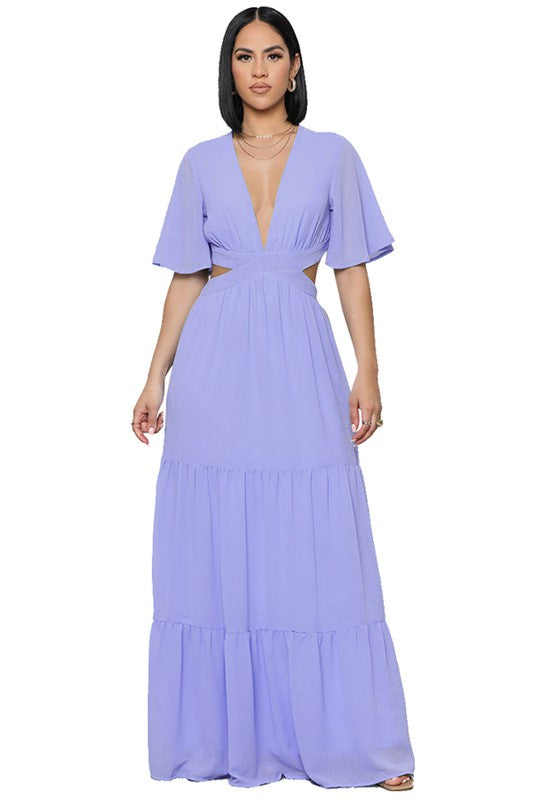 The sexy chiffon maxi dress features a flowing silhouette, delicate sheer fabric, and a flattering, figure-skimming fit that drapes gracefully from neckline to hem for an effortlessly alluring look.