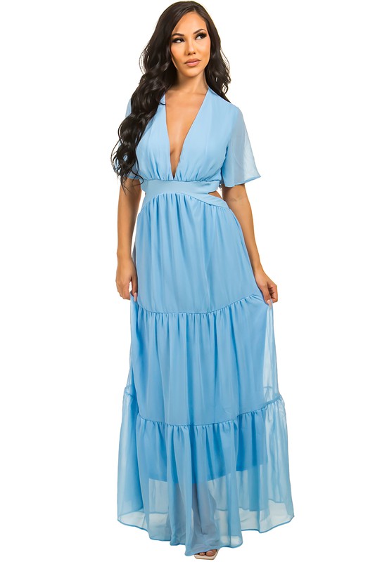 The sexy chiffon maxi dress features a flowing silhouette, delicate sheer fabric, and a flattering, figure-skimming fit that drapes gracefully from neckline to hem for an effortlessly alluring look.