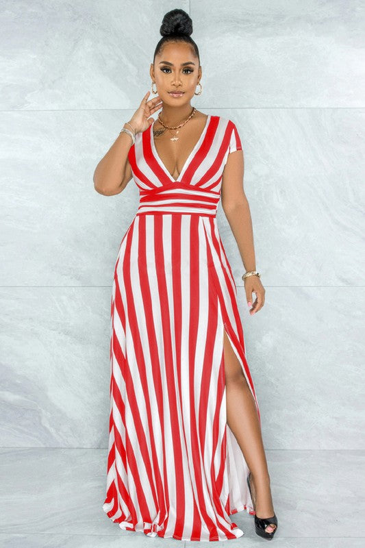 The dress “sexy-long-maxi-dress-2” is a figure-flattering, floor-length silhouette that combines a sleek, fitted bodice with a flowing, dramatic skirt to create a bold, glamorous look.