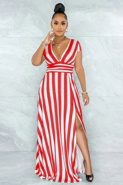 The dress “sexy-long-maxi-dress-2” is a figure-flattering, floor-length silhouette that combines a sleek, fitted bodice with a flowing, dramatic skirt to create a bold, glamorous look.