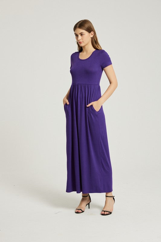The Womens Summer Casual Maxi Dress with Pocket is a breezy, lightweight dress designed for everyday comfort, featuring a flowing silhouette and a convenient side pocket for practicality.
