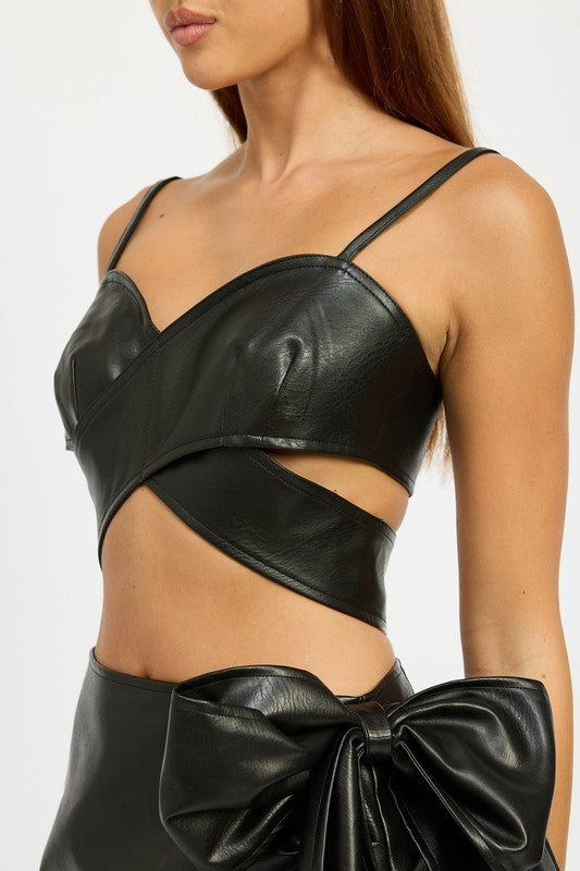 Crafted from faux leather with a smooth finish.