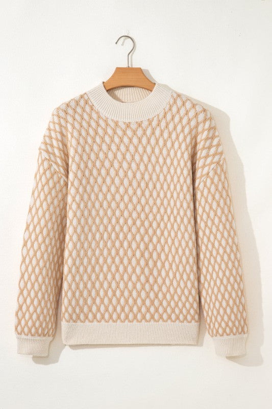 Beige and cream rhombus textured sweater, featuring a mock neck, ribbed cuffs, and hem, front view.