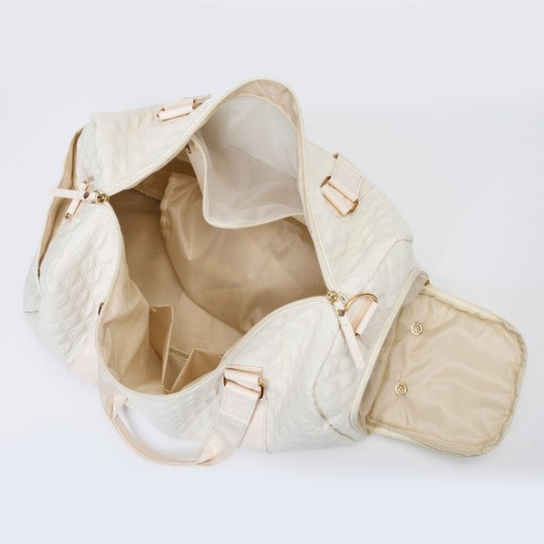 Versatile quilted travel carry-on in a sleek color, offering comfortable and chic transport.