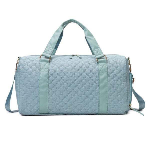 Fashionable light blue quilted weekend bag with a durable design, perfect for short trips.